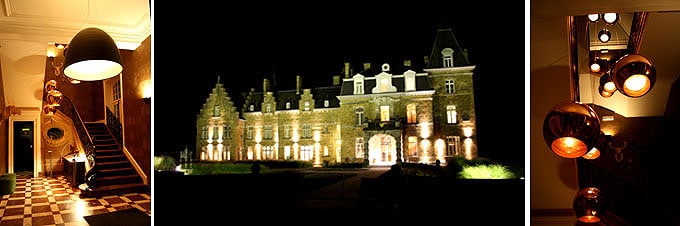 Das Chateau de la Poste angstrahlt mit Leuchten im Belgien Urlaub